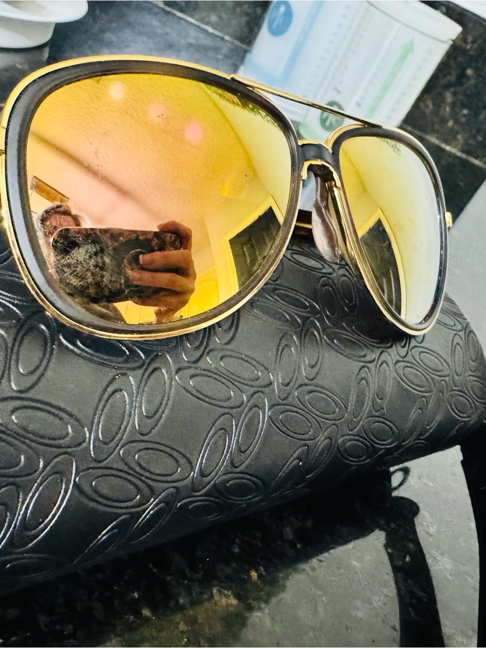 Oakley Women’s Aviator Sunglasses with Gold Frame and Yellow Mirrored Lenses